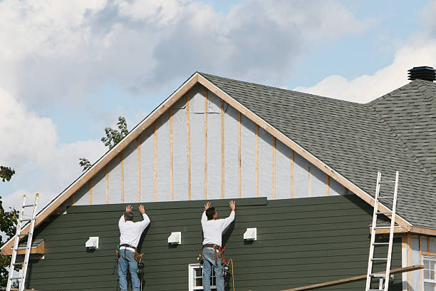 Professional Siding Contractor technician working in Cambridge, MA